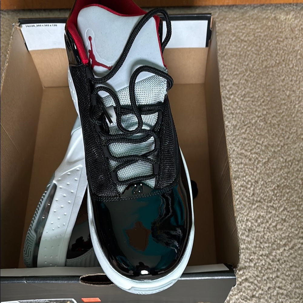 Black and White Sneakers with Red Detail